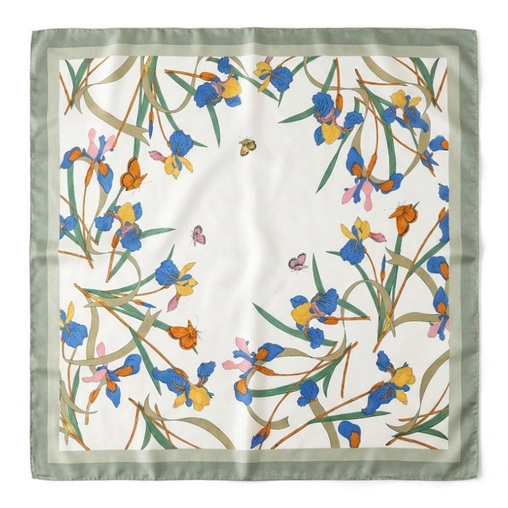 Foulard carré en satin avec motifs floraux colorés sur fond blanc, encadré d'une bordure verte