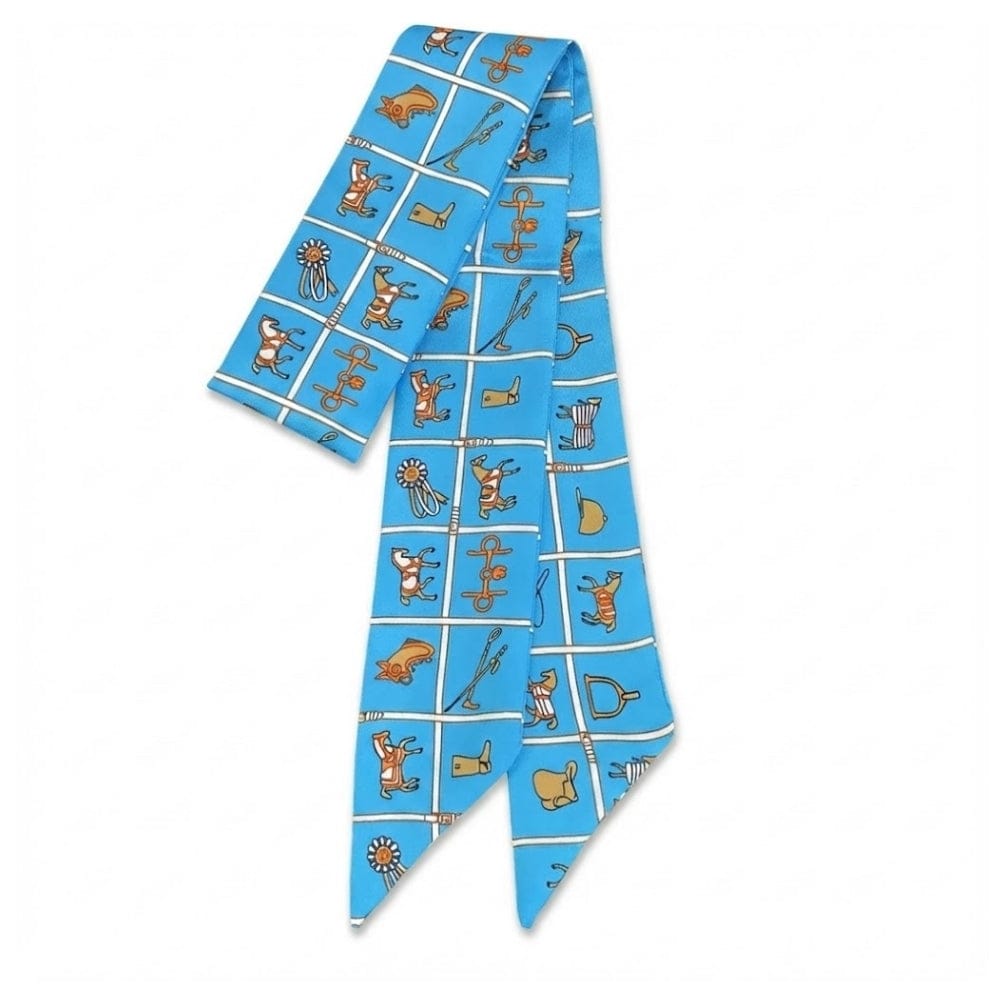 Foulard en satin bleu avec motifs graphiques colorés, idéal pour accessoiriser un sac à main